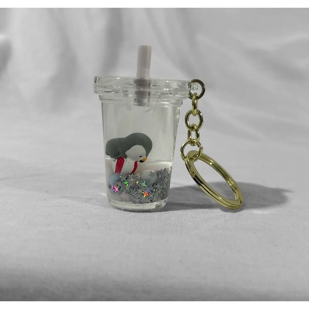 PENGUIN FLOATY KEYCHAIN GLITTERY LIQUID MOTION WAVES